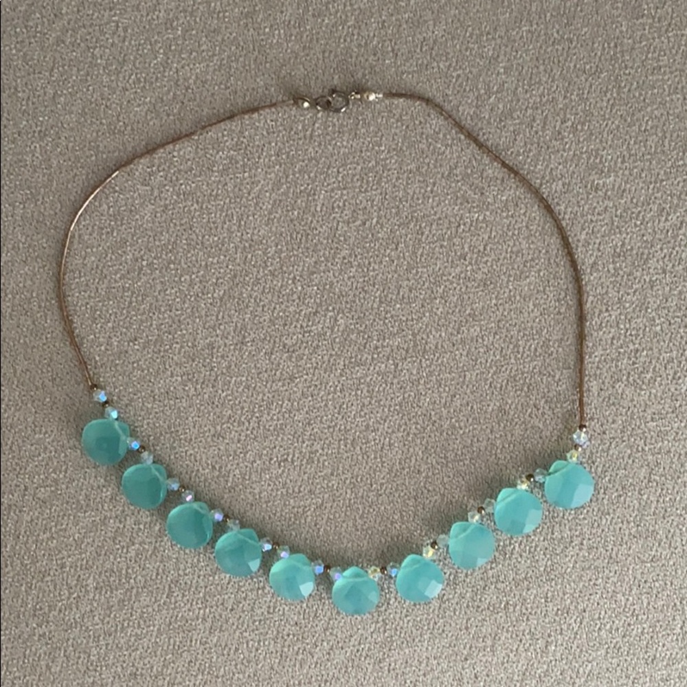 Silver necklace with blue stones